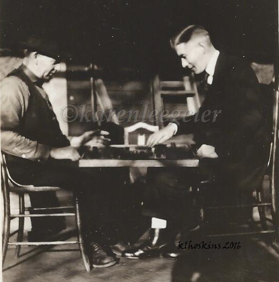 Butterfield Geier_elmer-and-carl-playing-checkers-on-porch_1920-or-so_tacoma