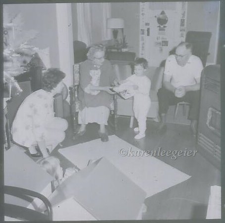 haggie geier christmas_grandma handing me a gift_grandpa Haggie and mom and lynne